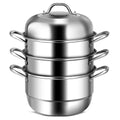 Assembled three-tier stainless steel stockpot and steamer on white background
